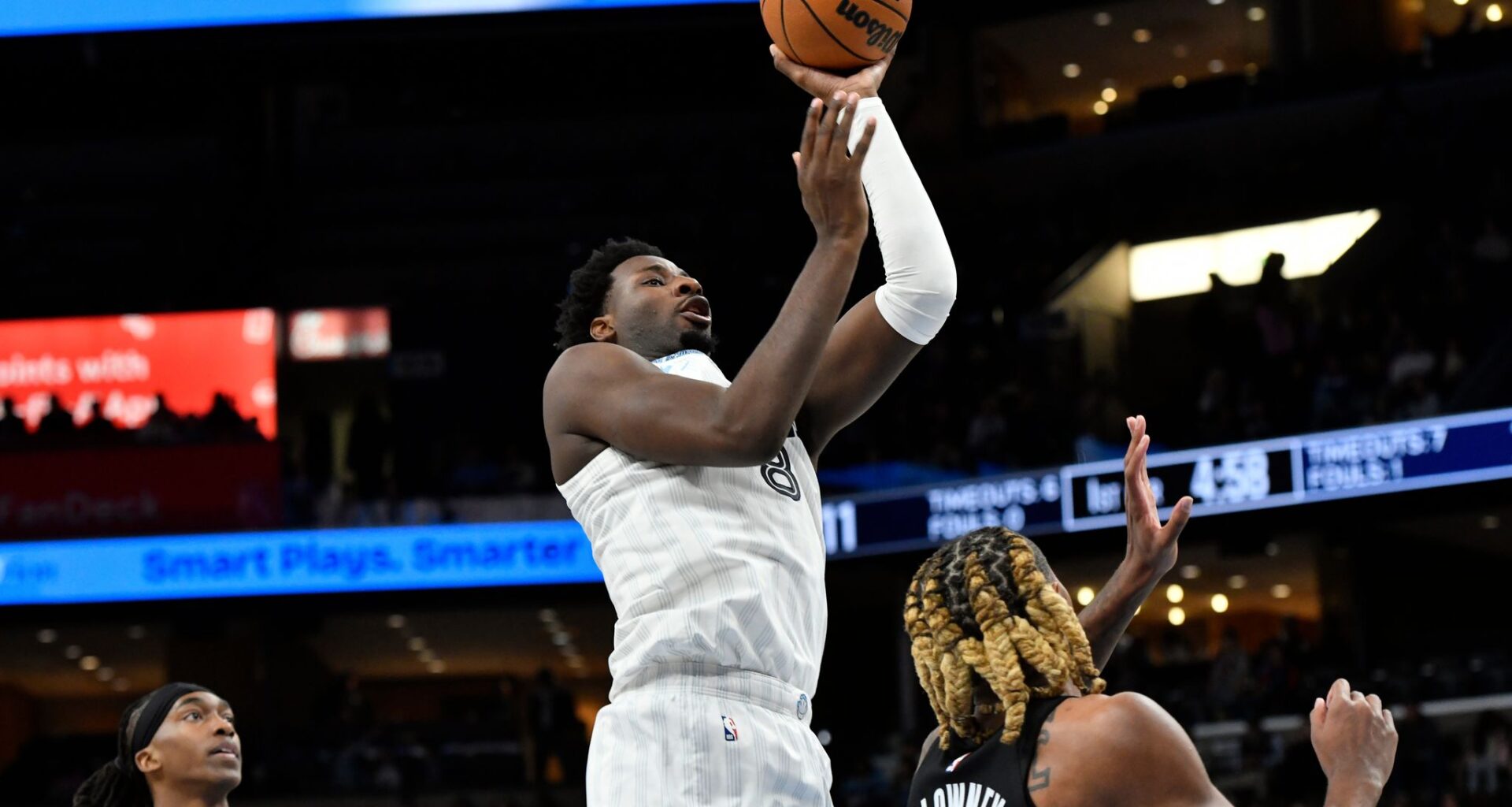 Cedric Coward hits 2 late 3s to help the Grizzlies beat the Nets 103-98