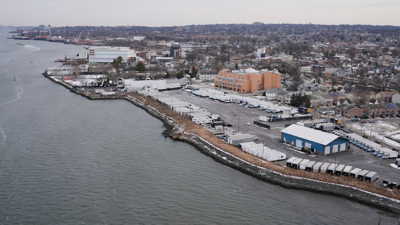The coast of Staten Island is seen in New York, Friday, Jan. 23, 2026. (AP Photo/Seth Wenig)