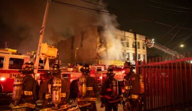 Queens three-alarm fire at tire shop and apartment building injures two firefighters – amNewYork