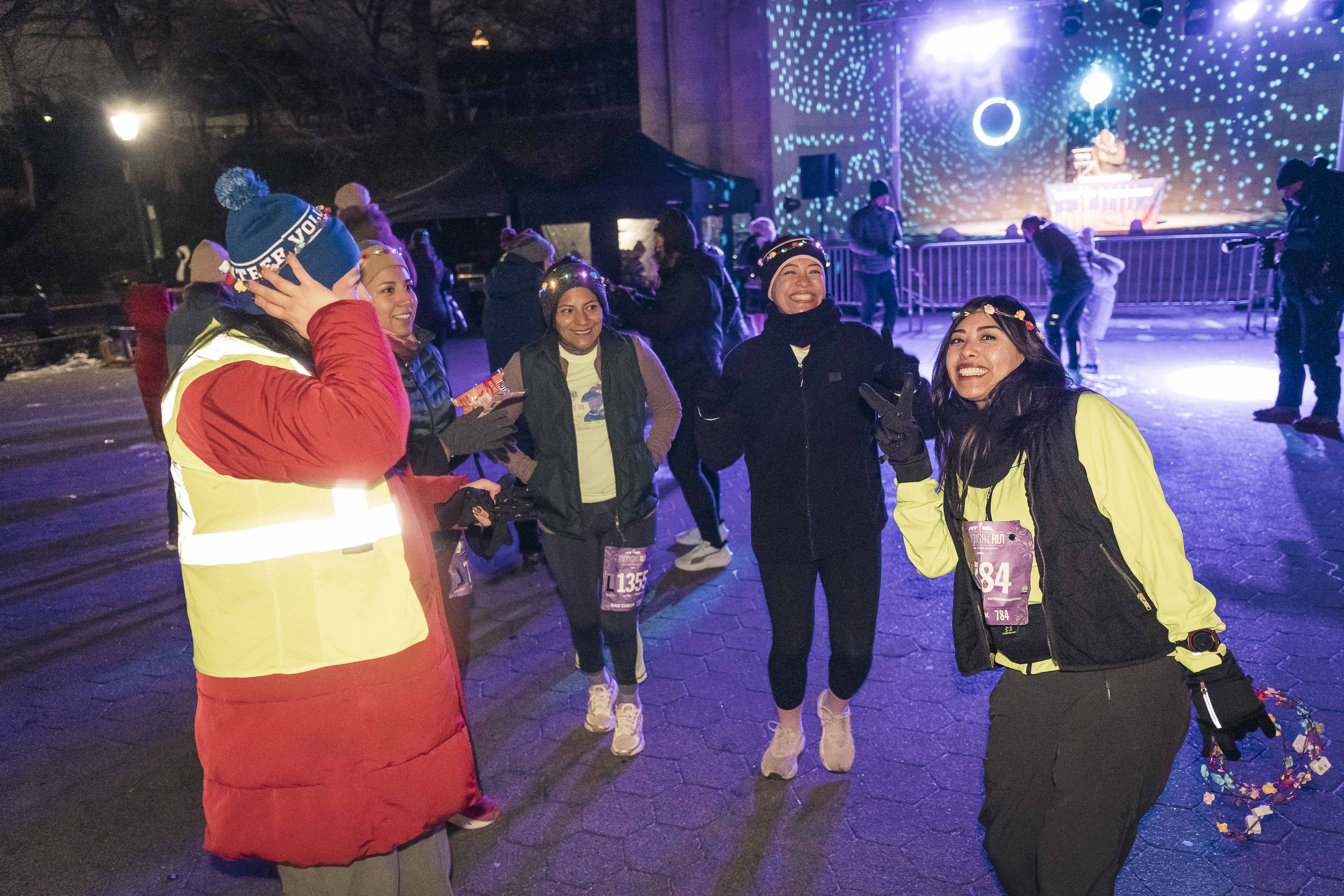 Runners gather at the Naumburg Bandshell in Central Park for pre-run celebrations.