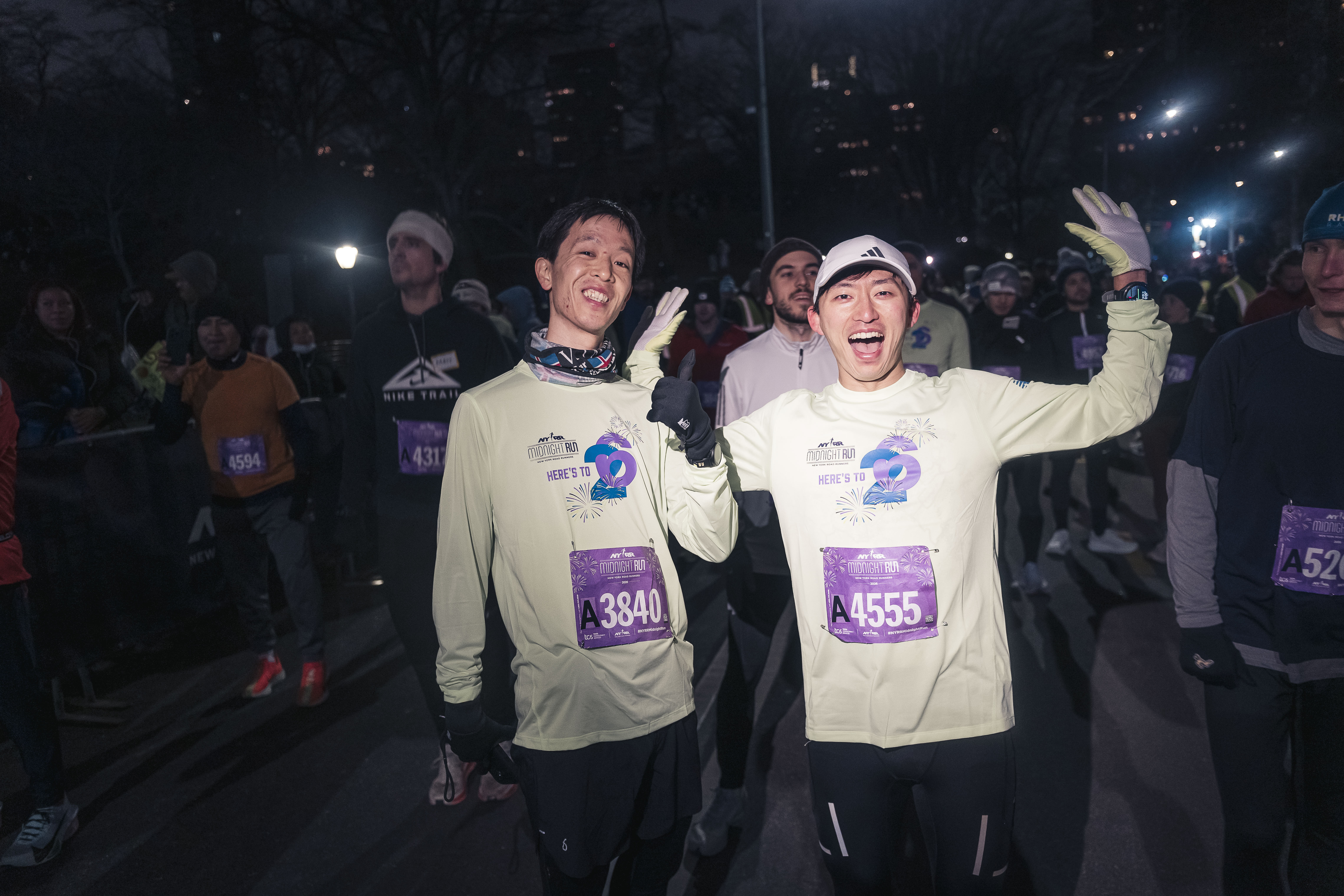 Runners at the start line pose for an image.