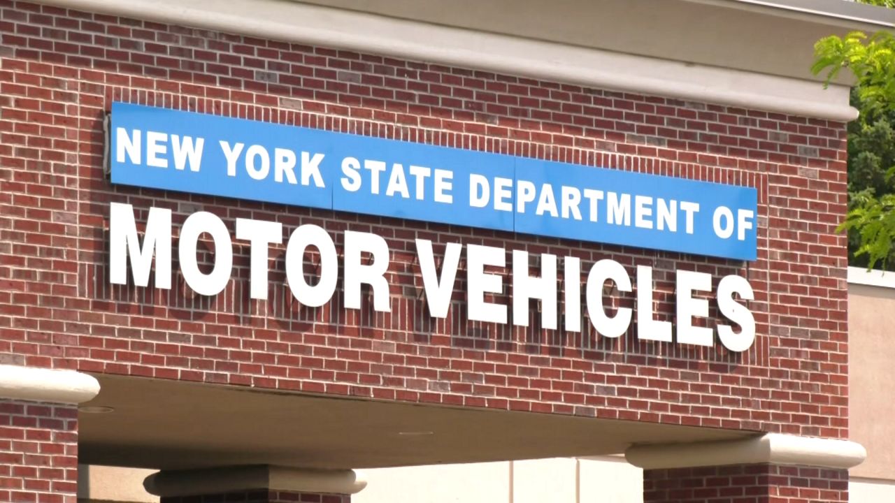 building facade reading 'new york state department of motor vehicles'