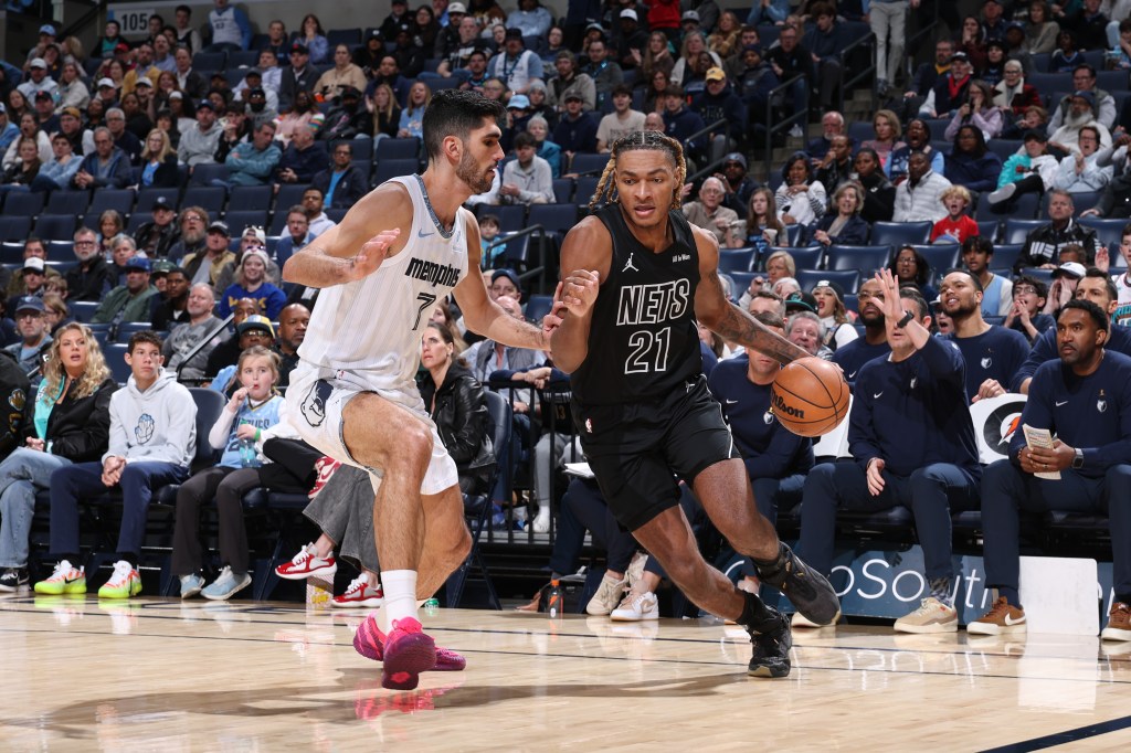 Noah Clowney #21 of the Brooklyn Nets drives to the basket during the game against the Memphis Grizzlies on January 11, 2026 at FedExForum in Memphis, Tennessee. 