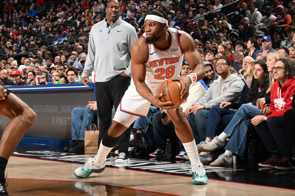 Guerschon Yabusele #28 of the New York Knicks dribbles the ball during the game against the Philadelphia 76ers on January 24, 2026.