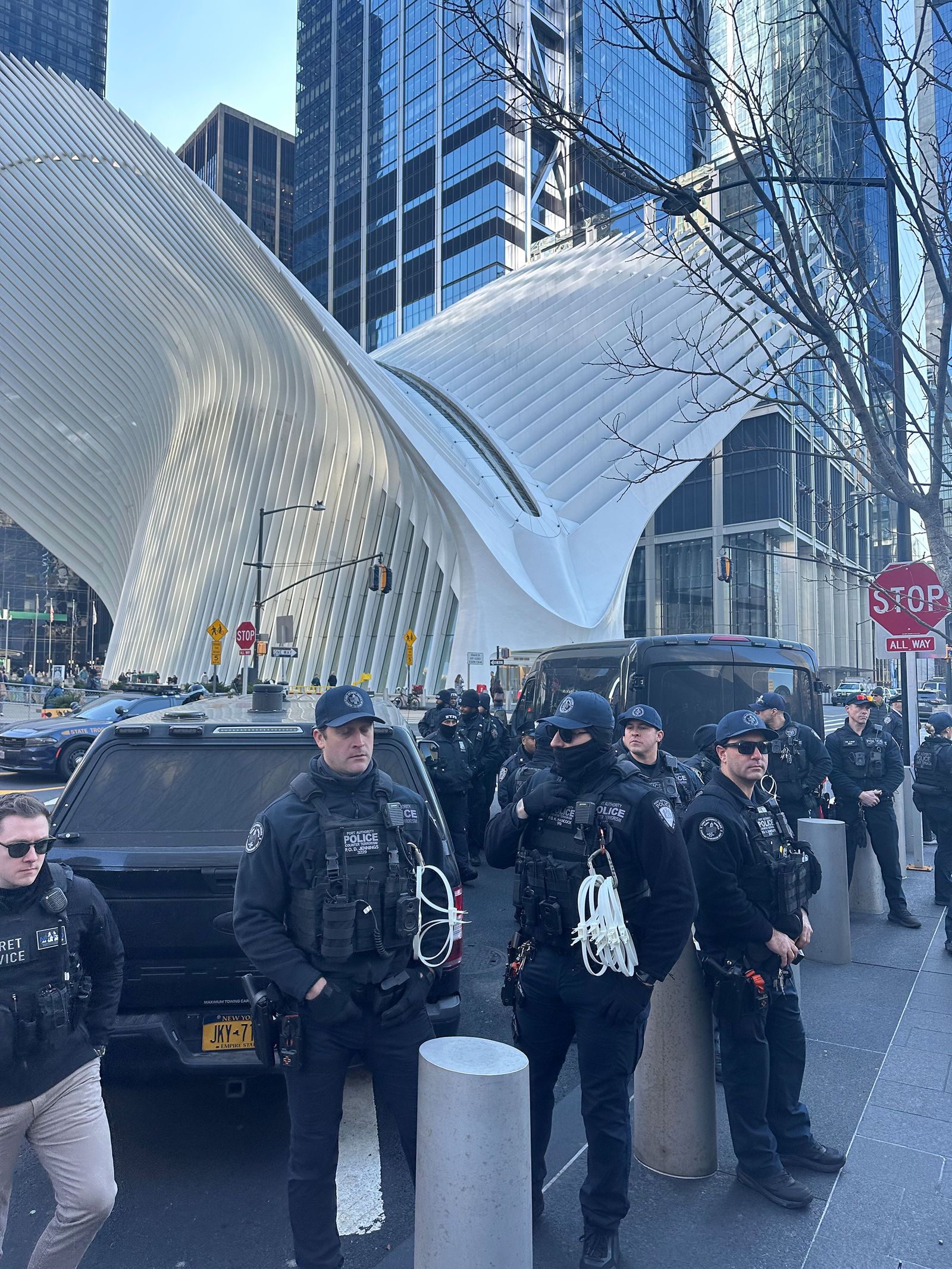 Image may contain Erik Kratz Walter Jones Officer Person Police Officer Adult Car Transportation Vehicle and Urban