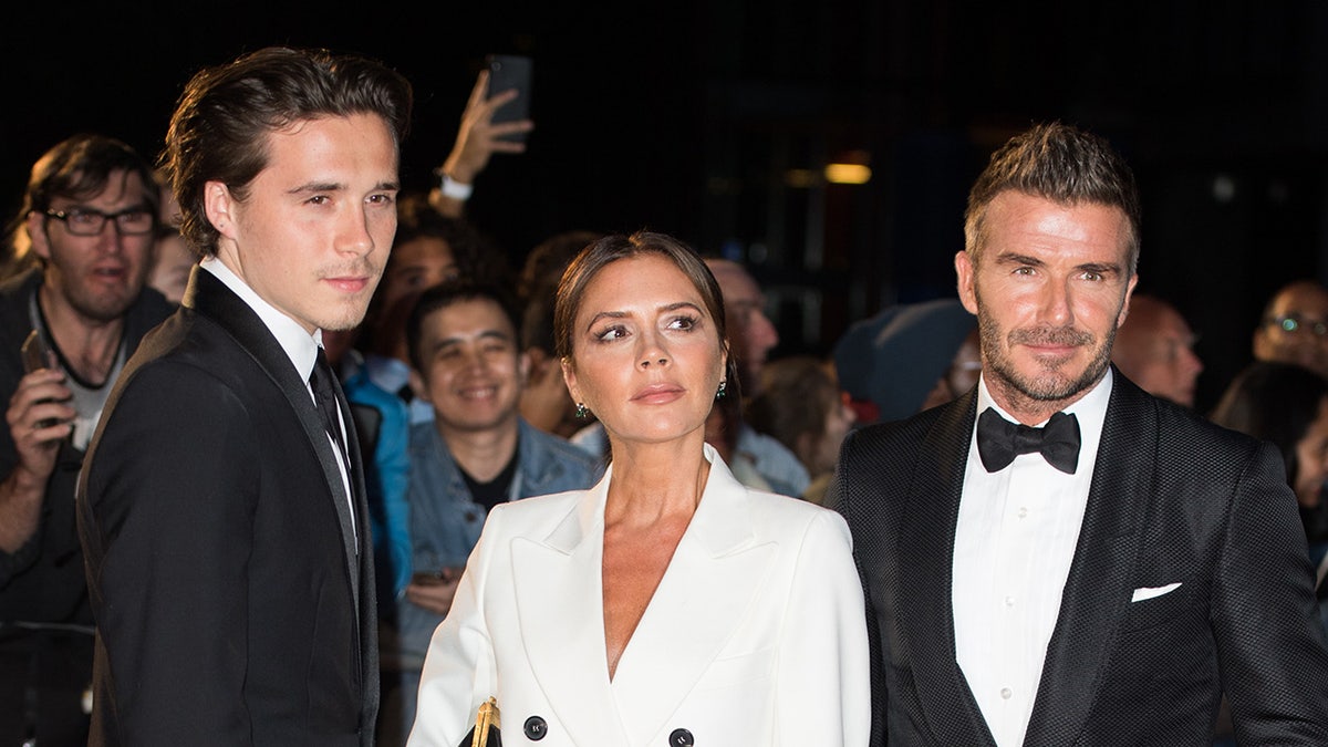 Daiv and Victoria Beckham with son Brooklyn