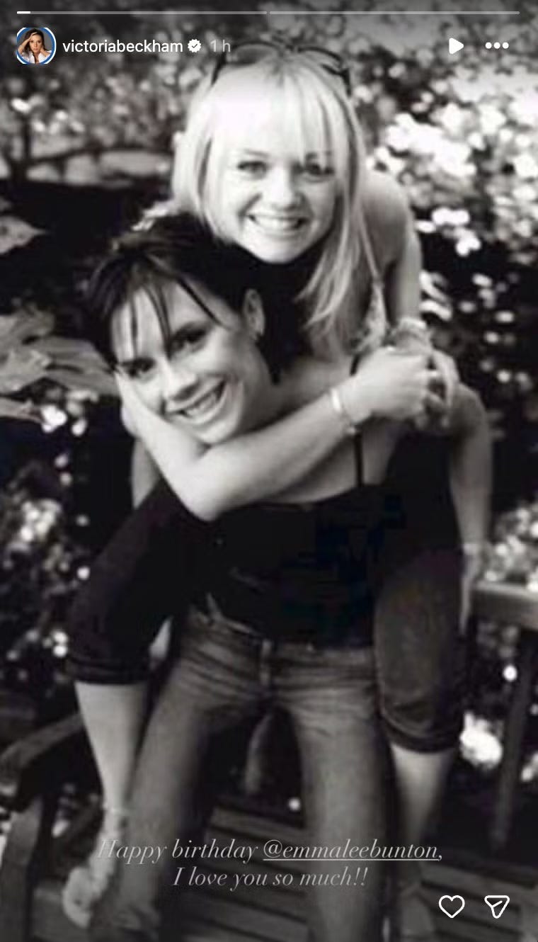 black and white image of two women in a playful pose outdoors black and white image of two women in a playful pose outdoors