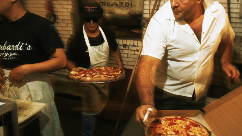 Pizzas are being made at Lombardi's in NYC