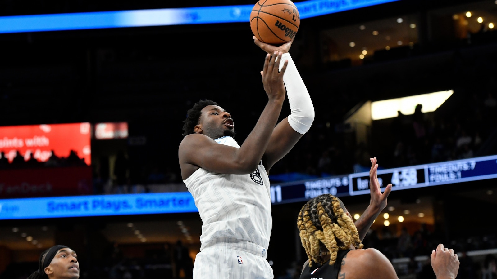 Cedric Coward hits 2 late 3s to help the Grizzlies beat the Nets 103-98