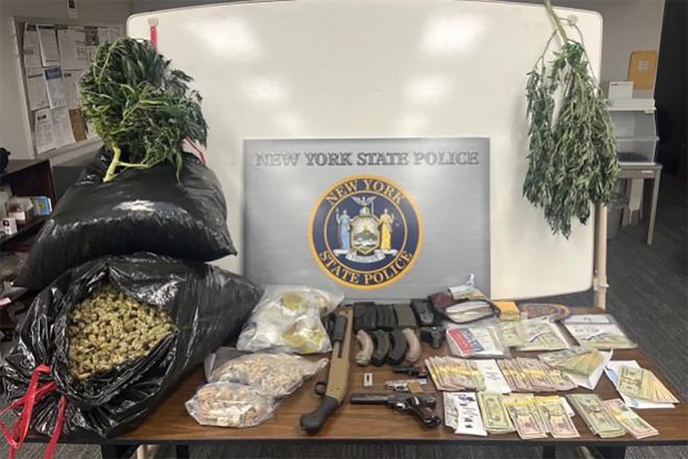Dozens of marijuana plants and several ounces of psilocybin mushrooms were found Wednesday, Jan. 14, 2026, at the Homer residence of Clayton and Jeffrey Carley, police said. (New York State Police)