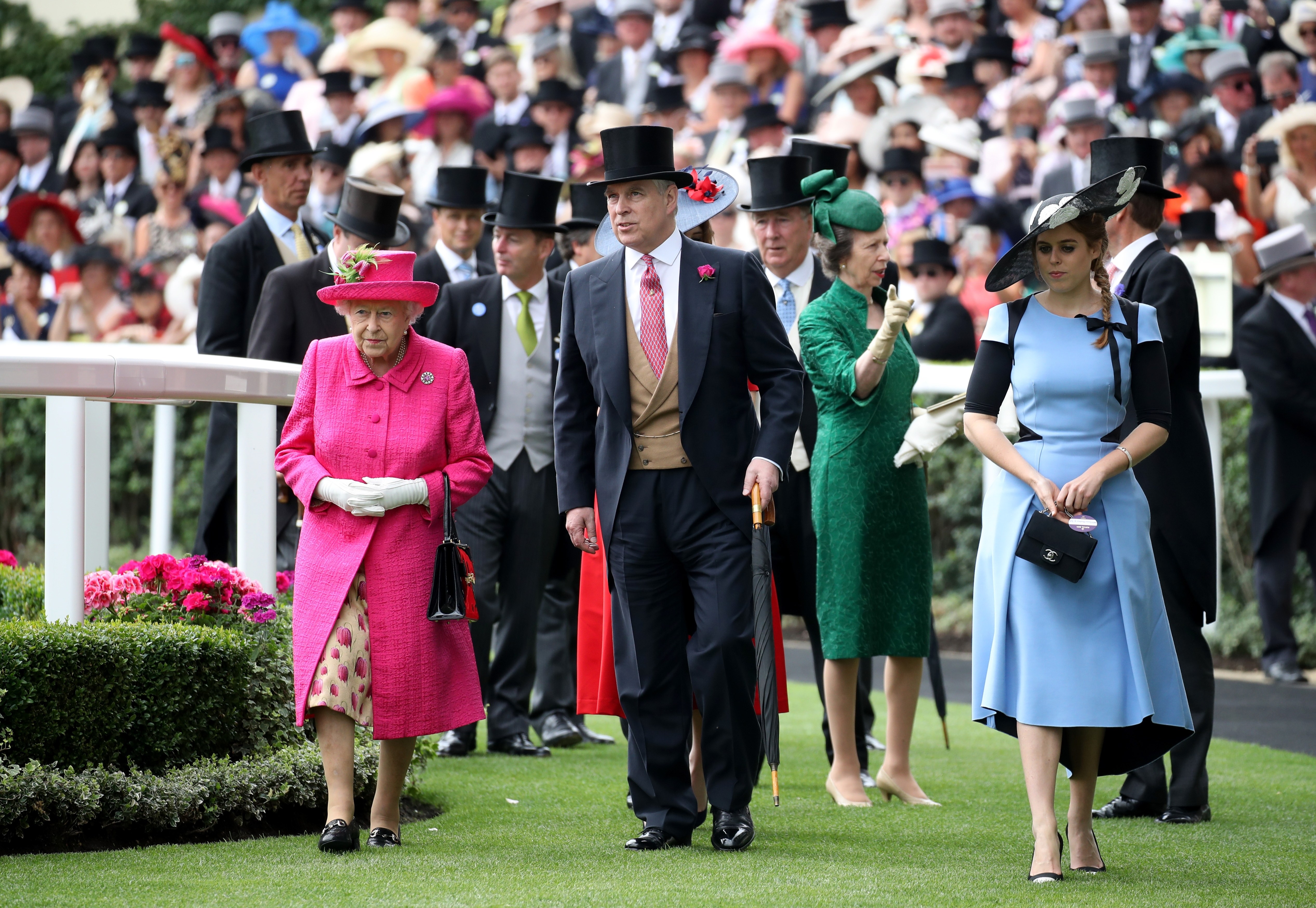 Queen Elizabeth II, Prince Andrew, Princess Anne, and Princess Beatrice at Royal Ascot 2017.