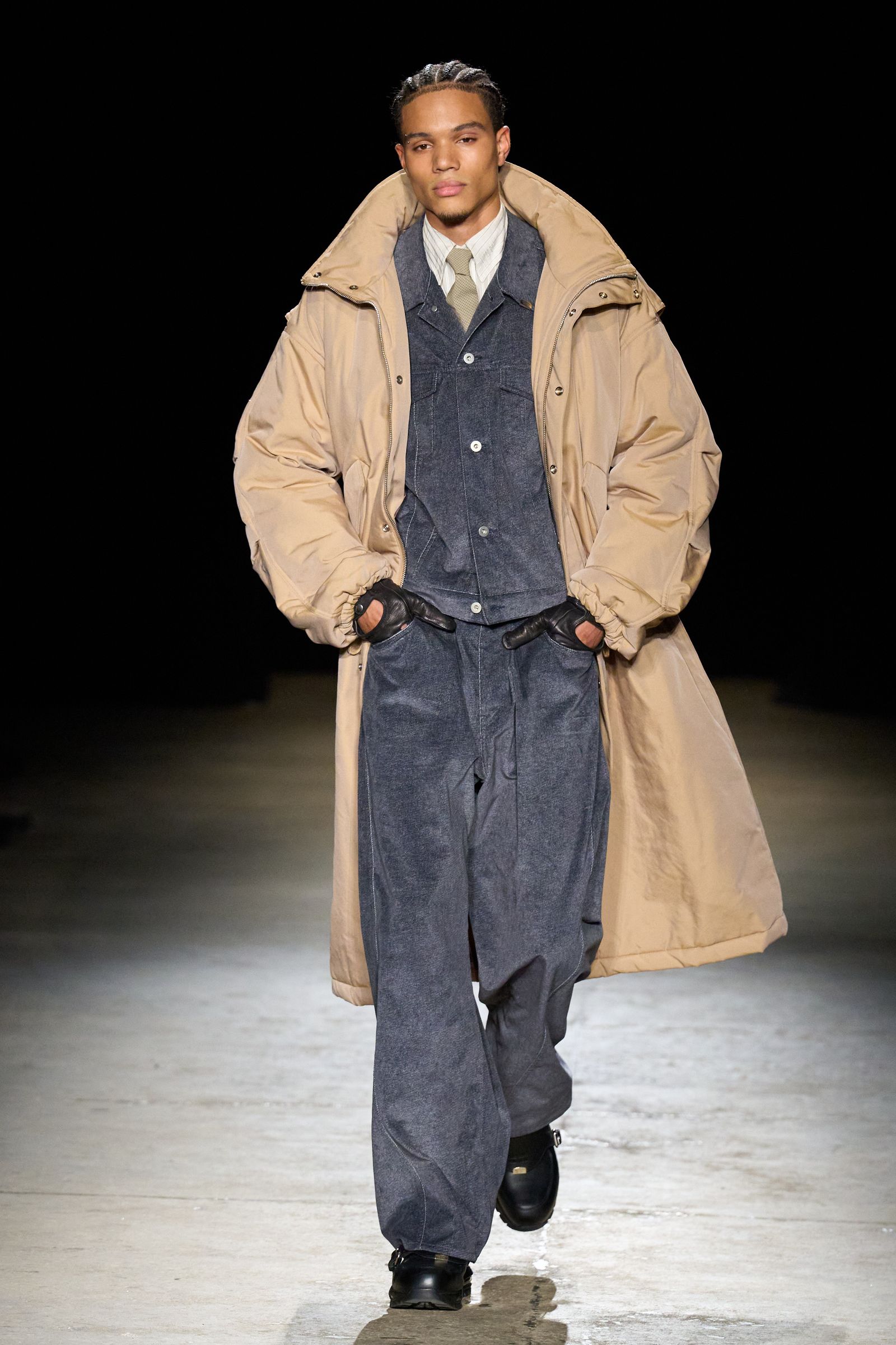 Image may contain Clothing Coat Fashion Adult Person Glove Overcoat Accessories Formal Wear and Tie