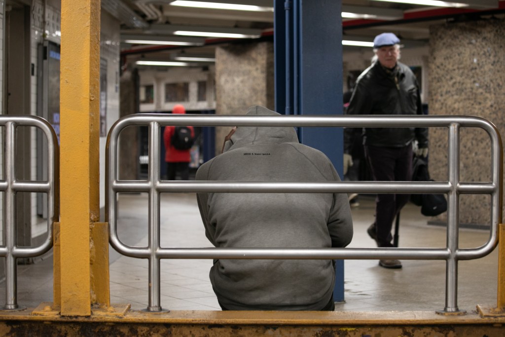 Homeless man John Lancaster finds shelter at the Union Square station during brutally cold day,