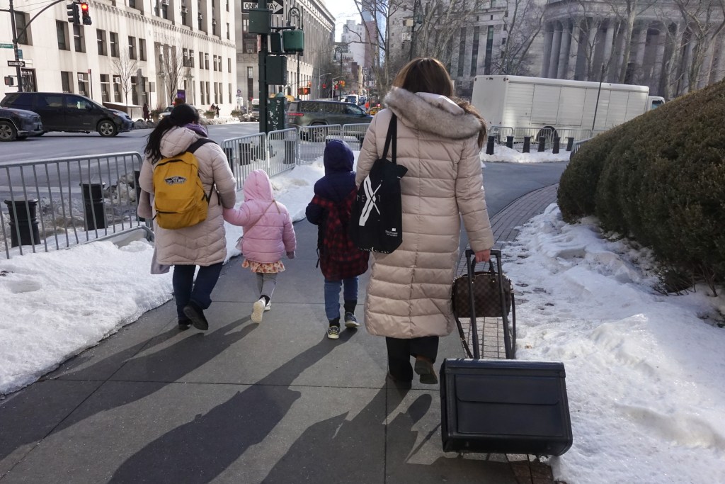 A family and their lawyer leave 26 Federal Plaza in Lower Manhattan to head back to eastern Long Island following a check in with ICE officials,