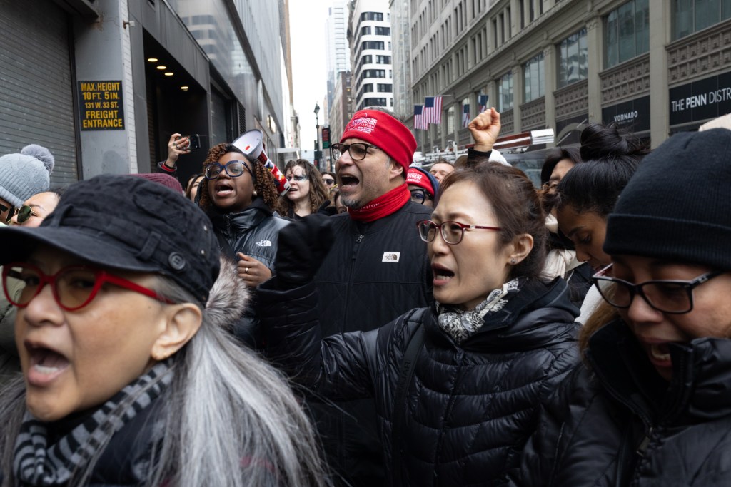 Striking nurse rally outside NYSNA union headquarters against a contract deal reached with management of Presbyterian hospitals