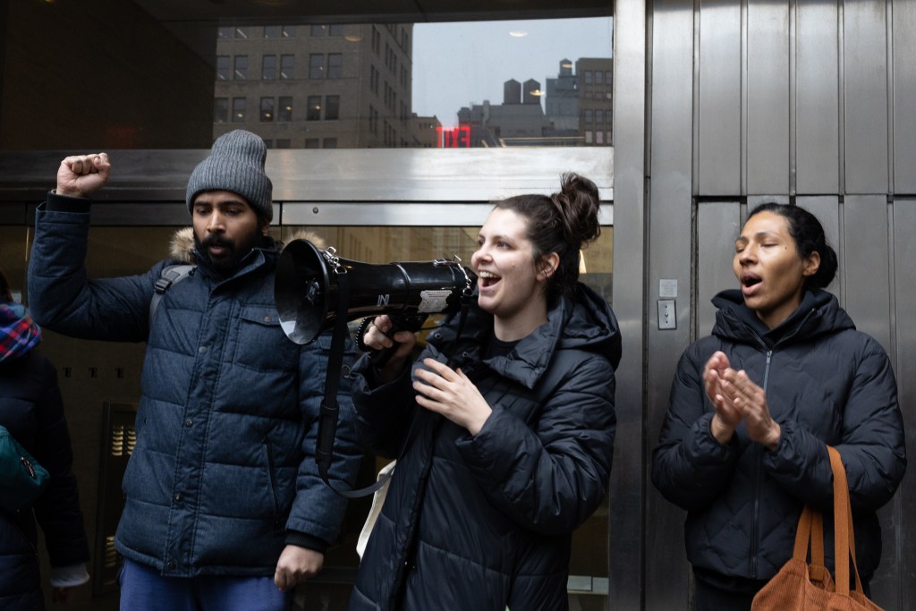 Striking Presbyterian nurses bargaining committee leader Beth Loudin addresses dozens of colleagues outside NYSNA headquarters in Midtown after delivering a letter to union leaders expressing their displeasure with a potential contract agreement, Feb. 11, 2026.