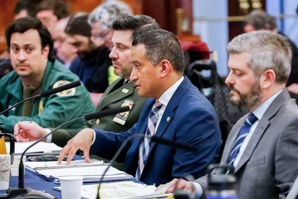 Sanitation Commissioner Javier Lojan testifies at a Council hearing about their efforts to clear snow while two blizzards walloped the city,