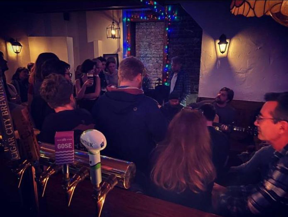 Visitors to Hartley's in Brooklyn enjoy a lively trad session inside the small pub