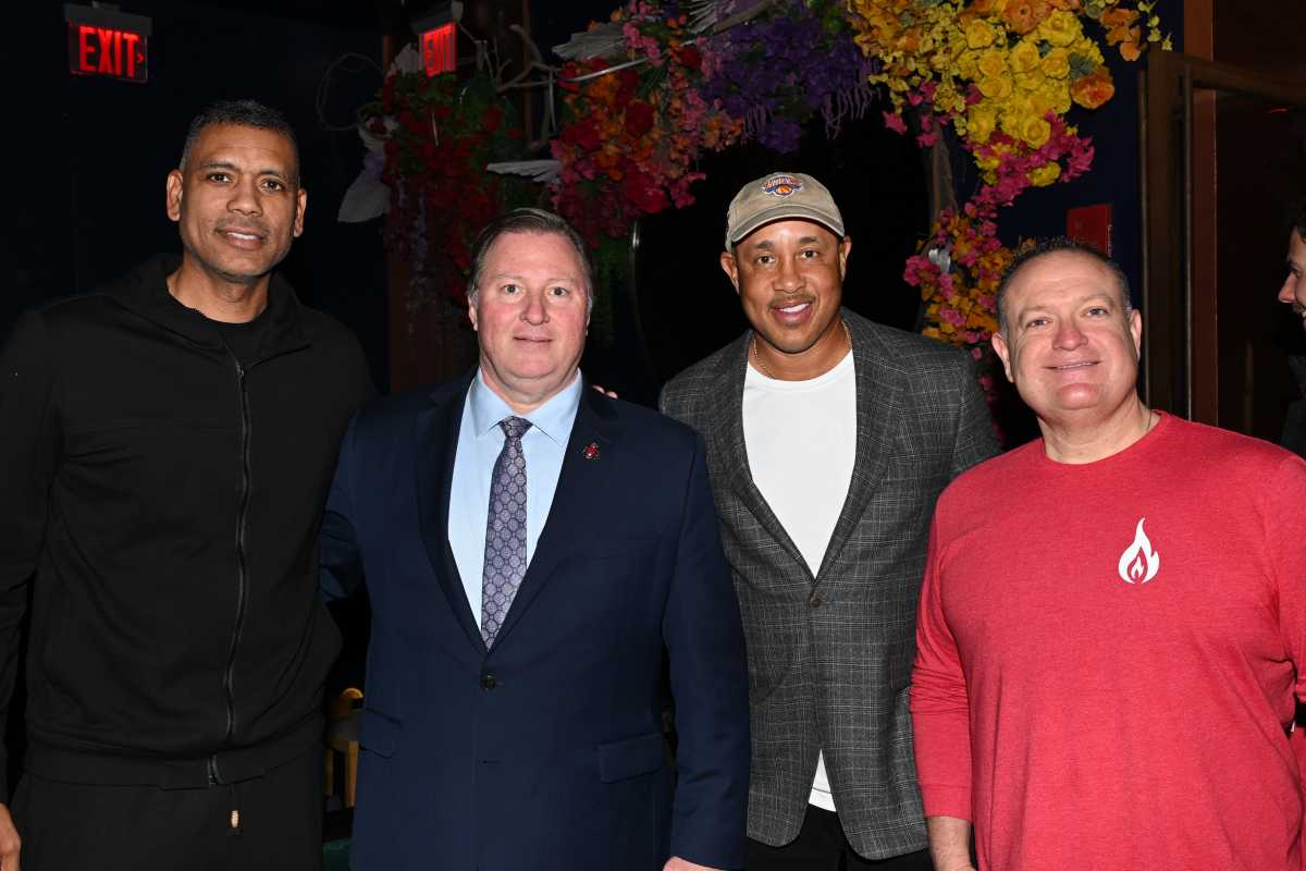 From left: Allan Houston, Uniformed Firefighters Association President Andrew Ansbro, John Starks, and Thomas J. McManus