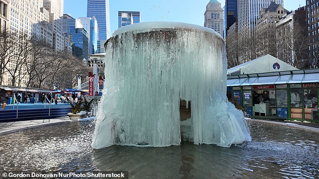The fountain in New York City's Bryant Park is pictured totally frozen over on February 2, during a long stretch of freezing or nearly-freezing temperatures