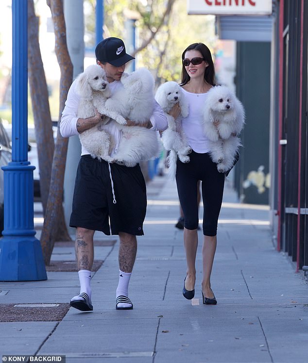 The couple wore matching outfits for the low-key outing with aspiring chef Brooklyn wearing basketball shorts and a white shirt, whilst his wife rocked pedal pushers and sling-back heels