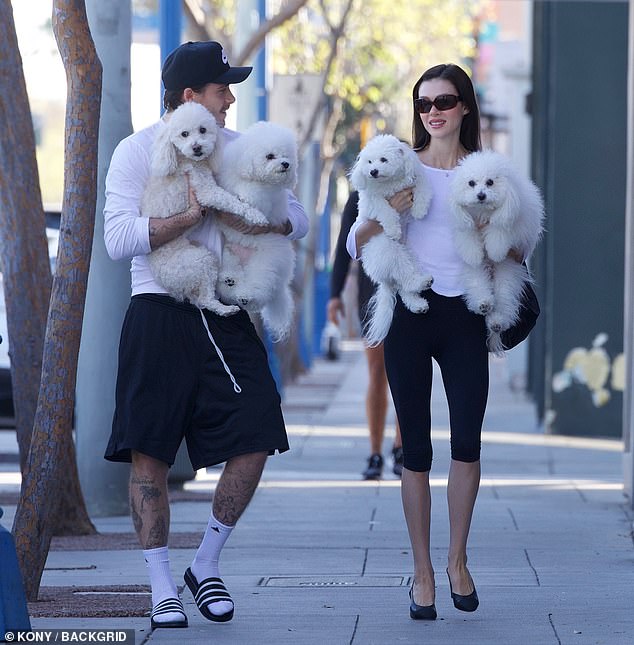 Brooklyn Beckham (left) and wife Nicola Peltz (right) looked perfectly coordinated as they ran an errand in Los Angeles