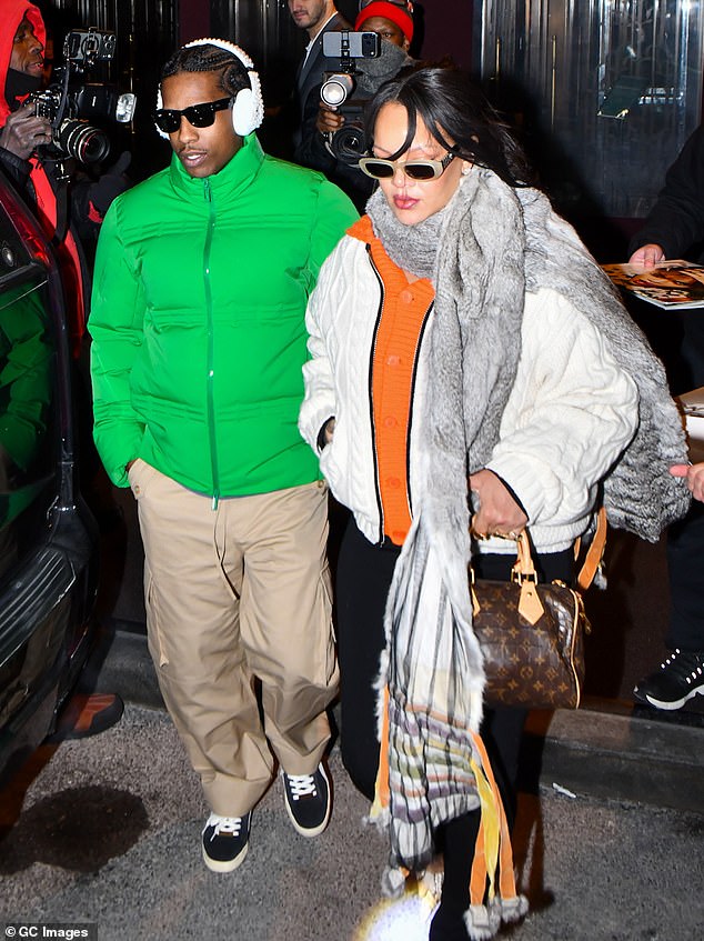 The couple been at the centre of marriage speculation this past year, fuelled by her referring to him as her 'loving husband' and him describing her as his 'wife' (Pictured together last month)