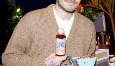 Brooklyn Beckham covered up his arms as he promoted his hot sauce range at a food festival on Thursday - after he was at spotted wearing a £220k watch gifted by his dad David earlier this week