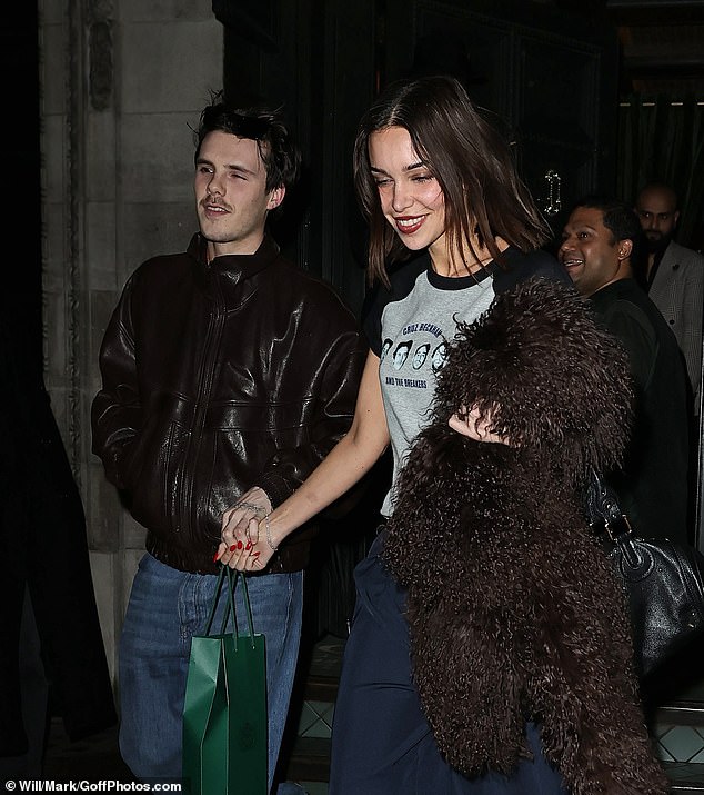 Despite the ongoing fallout, the family appeared with huge smiles on their faces after indulging at the Indian restaurant
