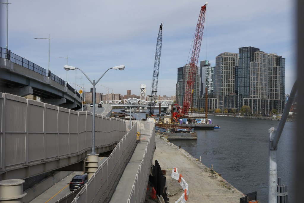 The city hired workers to create a new riverside park in East Harlem to protect against flooding