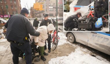 Harlem woman takes nasty spill on icy sidewalk when her 'life-risking' wheelchair ran into mount of snow