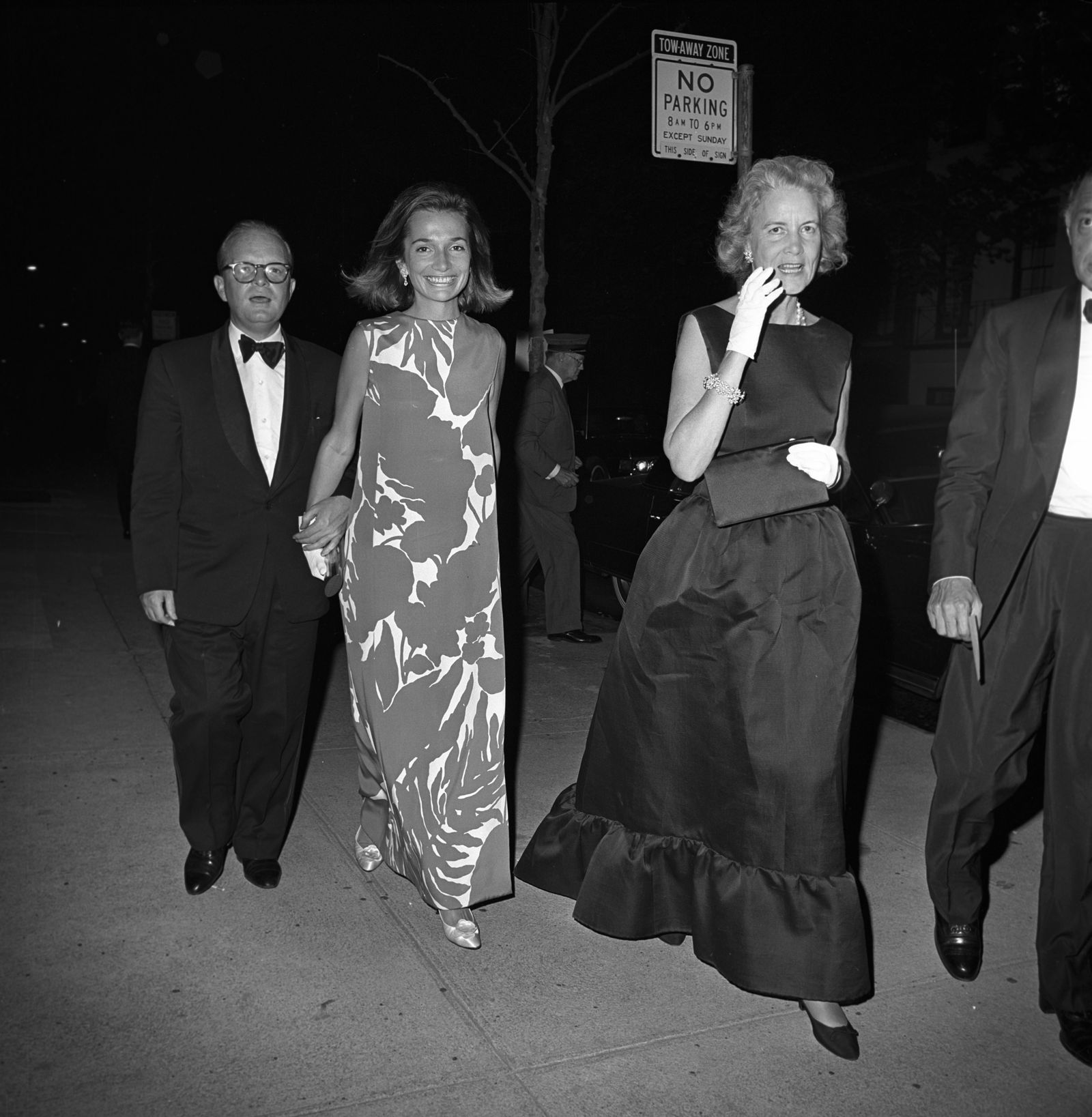 Image may contain Rachel Lambert Mellon Truman Capote Lee Radziwill Formal Wear Clothing Suit Dress Coat and Adult