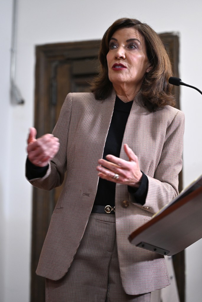New York Governor Kathy Hochul speaking at a podium.