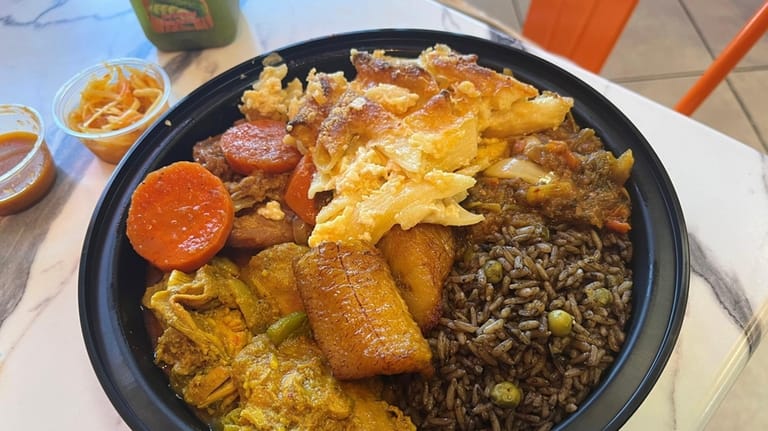 A combo bowl at Blue Mermaid in Uniondale includes curry...