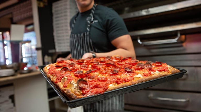 Danny Rocca, chef-owner of Dough & Co. Pizza in Huntington,...