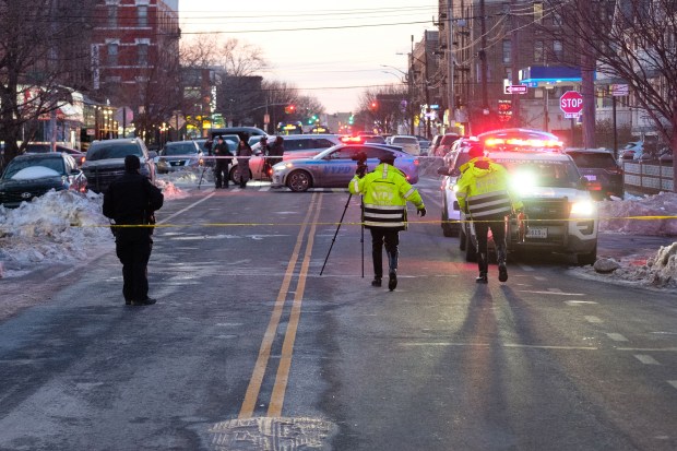 The NYPD Highway Patrol investigates on Thursday after Amira Aminova, 11, was fatally struck by a school bus on Bath Ave. in Brooklyn. (