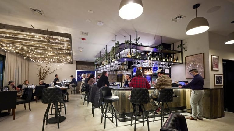 Inside Enology Wine Bar in St. James.