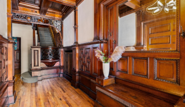 entry with wainscoting, built-in bench and more details