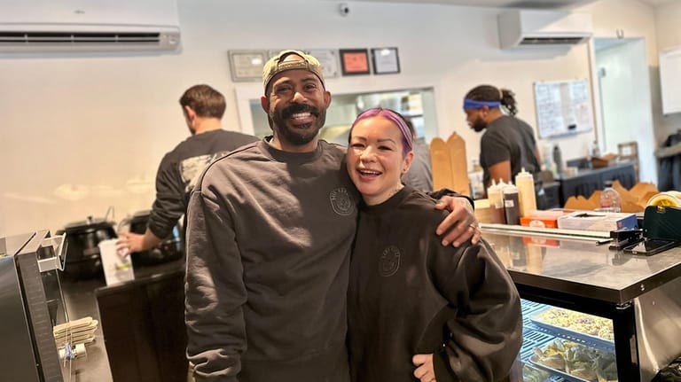 André du Chaussée, left, and Terri Novak are partners at...