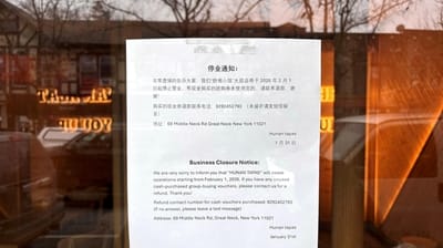 A sign at Hunan Tapas announces the restaurant was ceasing...