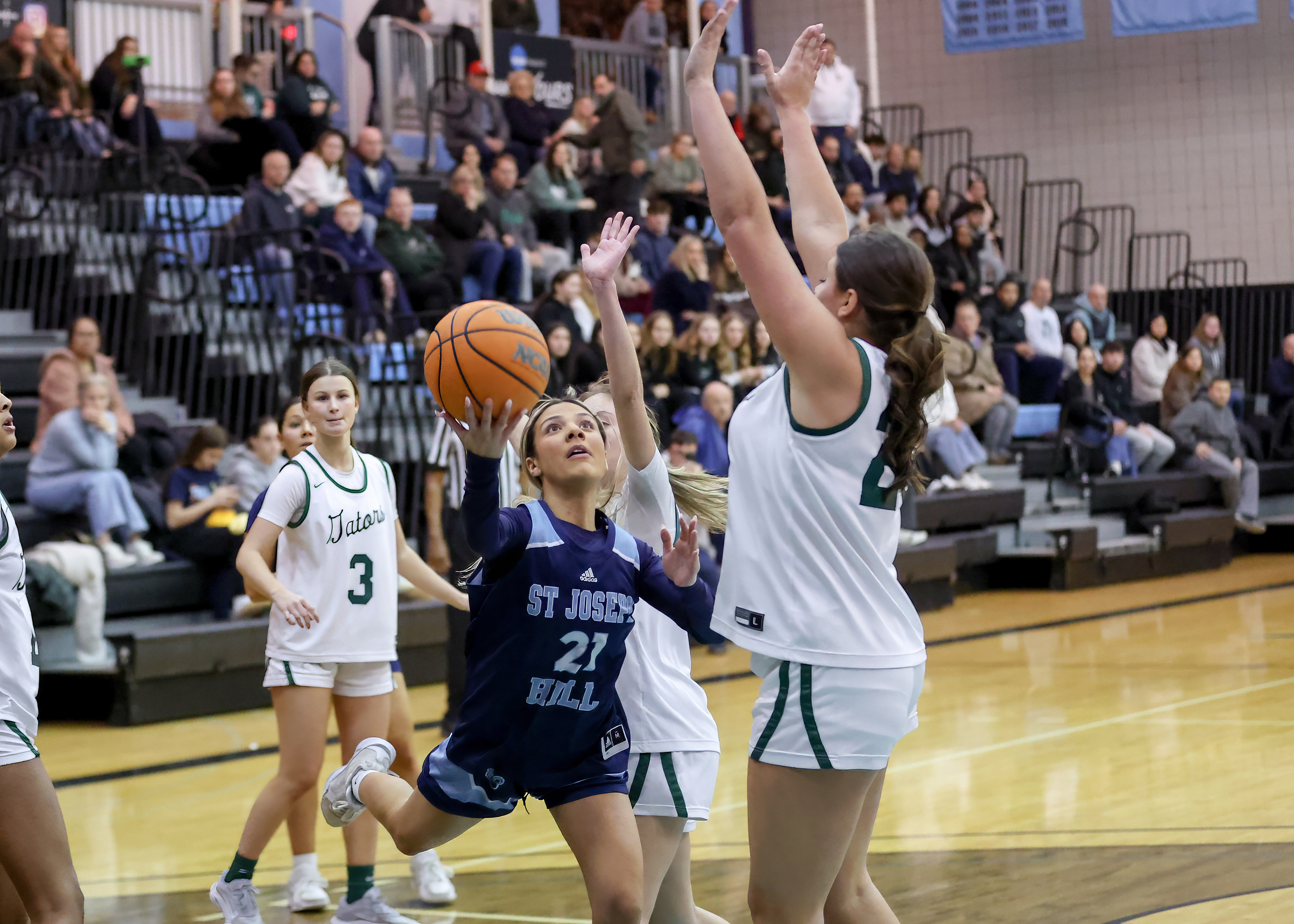 St. Joseph Hill's Lauren Rodriguez flips up the layup after getting fouled against Notre Dame Academy in the CHSAA Archdioscesan AA playoff semifinal at the College of Staten Island in Willowbrook on Thursday, Feb. 19, 2026. (Advance/SILive.com | Jason Paderon)
