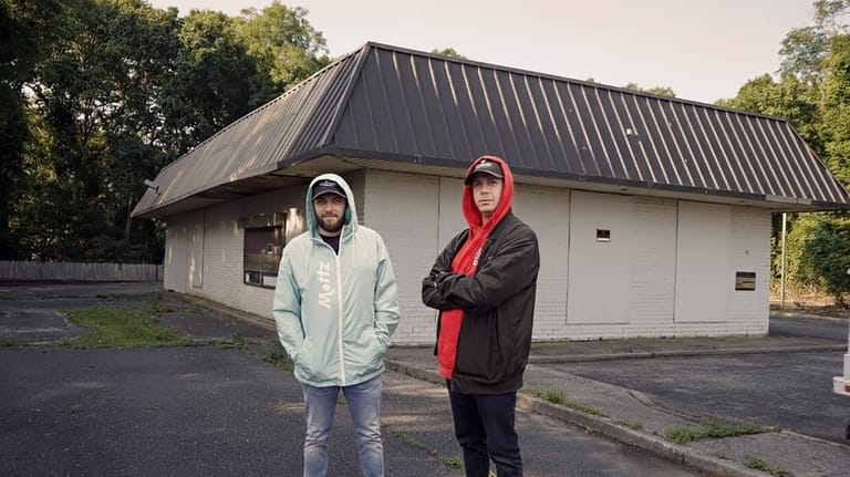 Brothers Sean and Joe Lustberg outside of the building in...