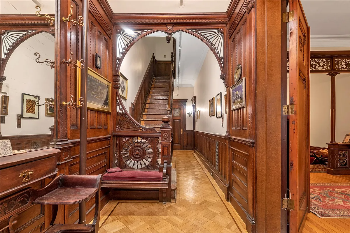entry with stair, fretwork,woodwork