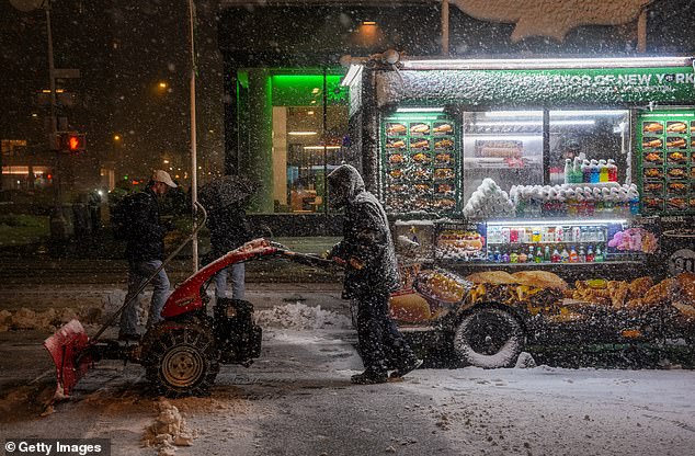 NEW YORK, NEW YORK - FEBRUARY 22: A man operates a snowplow on February 22, 2026 in New York City. A major winter storm is expected to hit the Northeast and Mid-Atlantic regions, bringing blizzard conditions with the potential for up to 23 inches of snow in New York City. A blizzard warning has been issued for large areas of the East Coast.  (Photo by Ryan Murphy/Getty Images)
