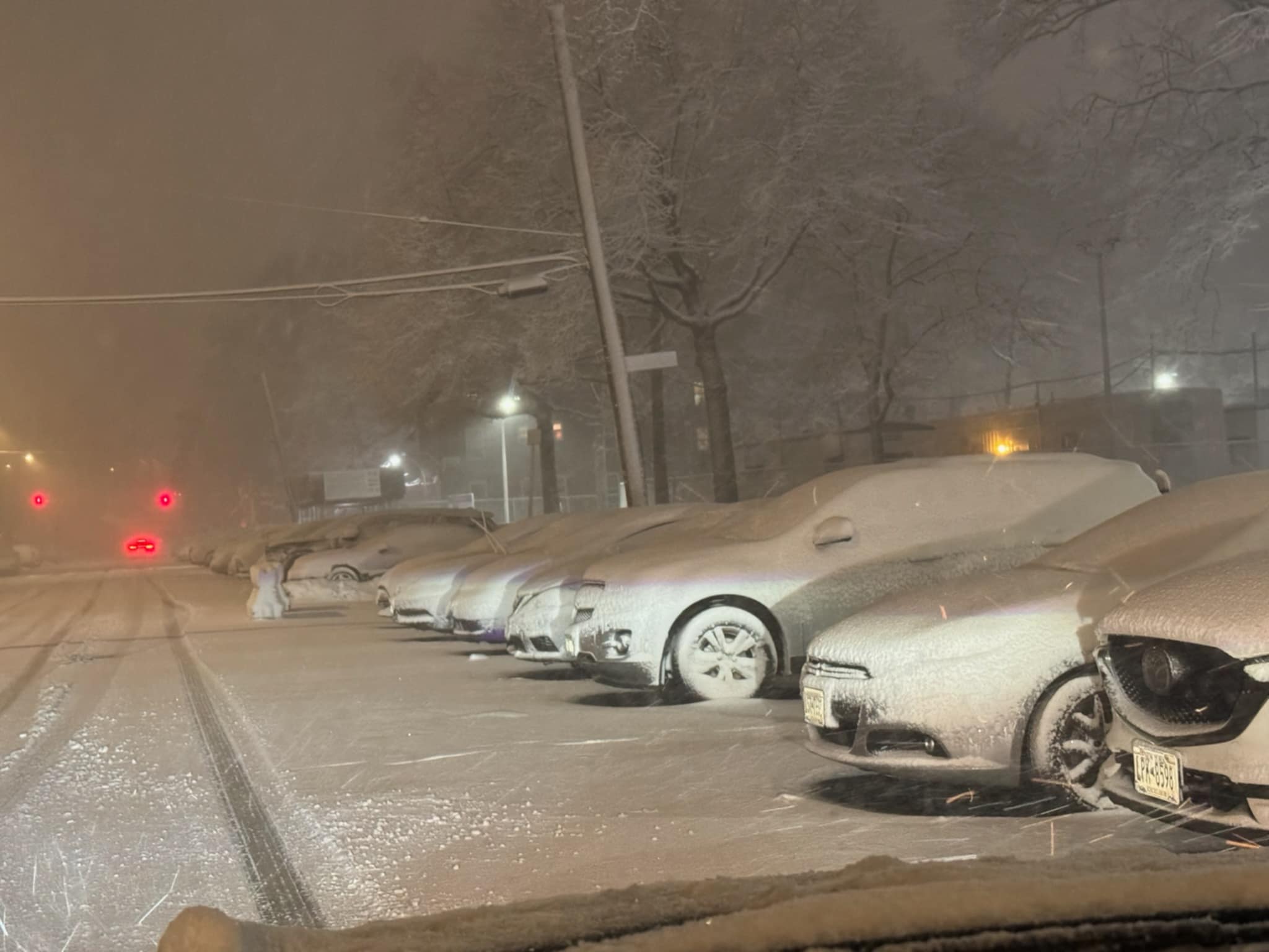 Snow accumulates at 6:30 p.m. on LaGuardia Avenue in Emerson Hill on Sunday, Feb. 22, 2026.