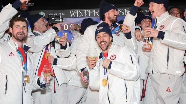 MILAN, ITALY - FEBRUARY 22: U.S. Olympians Dylan Larkin, Matthew...
