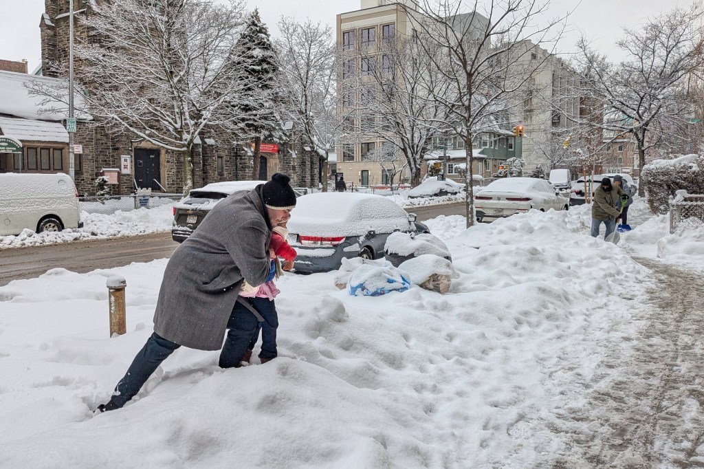 More snow falls on the Northeast US, where huge piles remain
