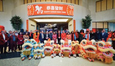 Resorts World New York City leadership, team members, and commu­nity partners gather in the Grand Lobby to cele­brate Lunar New Year and welcome the Year of the Horse.