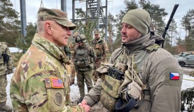 Major General Sean Flynn speaks with Czech soldier during NATO exercise