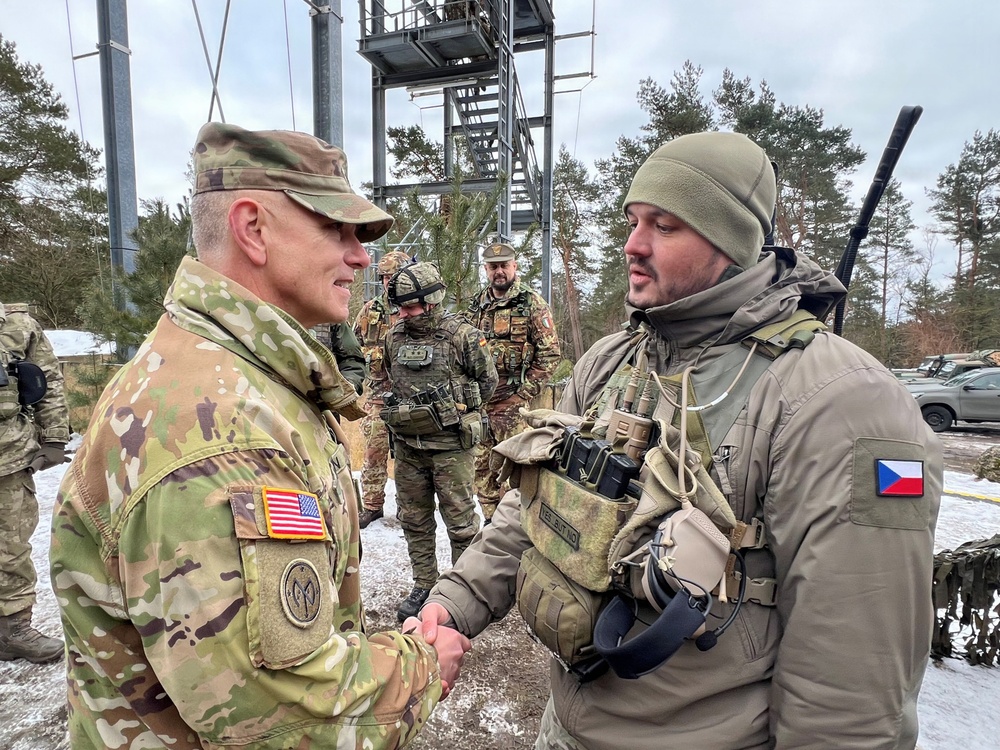 Major General Sean Flynn speaks with Czech soldier during NATO exercise